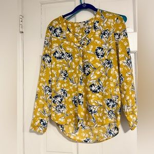 Marigold blouse with blue and white flowers